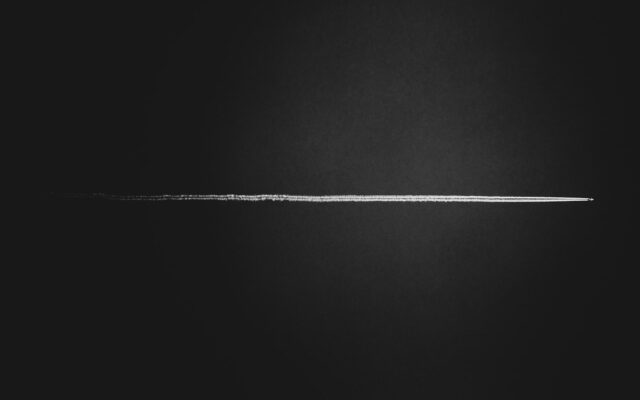 a black and white photo of a thin line