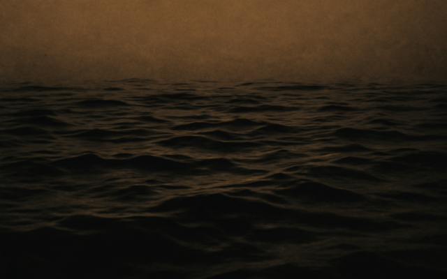 deep dark water surface