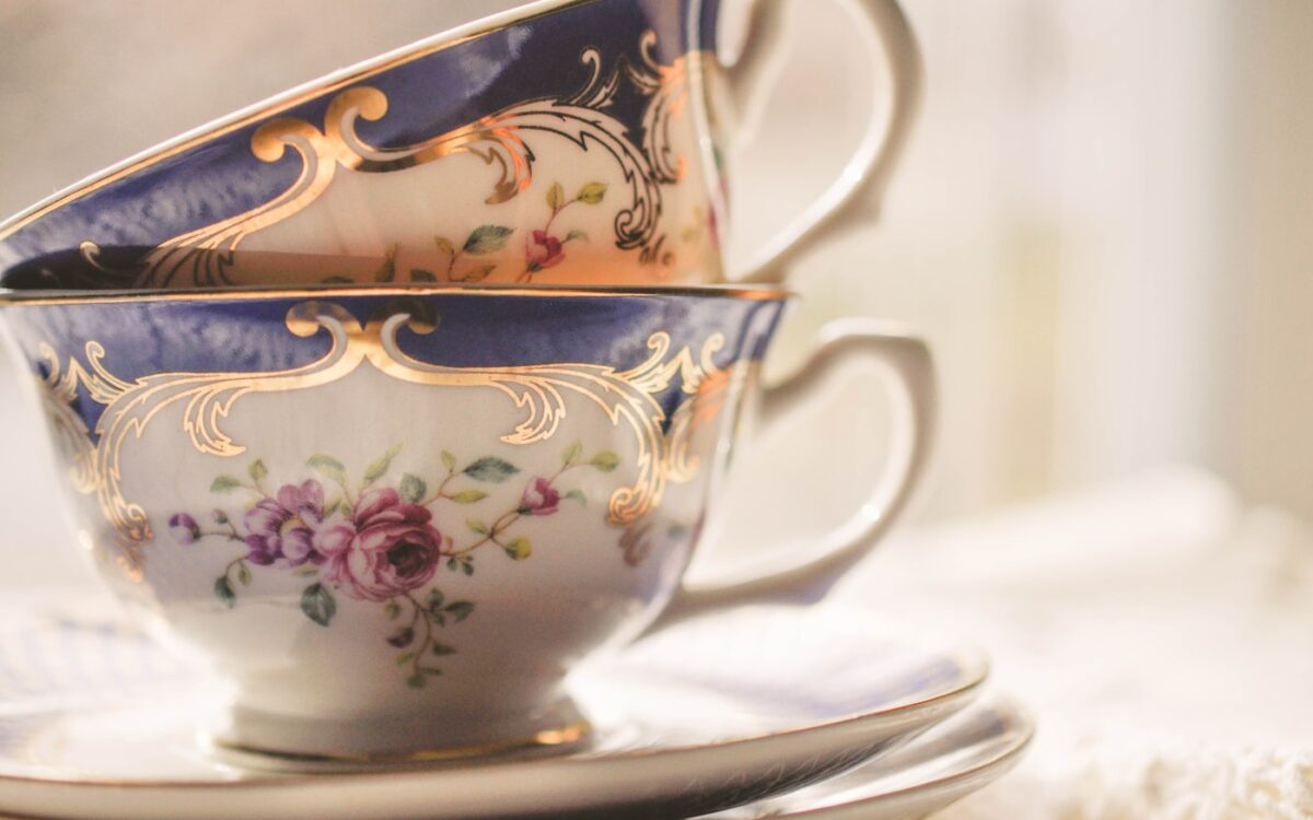 a stack of tea cups sitting on top of a saucer