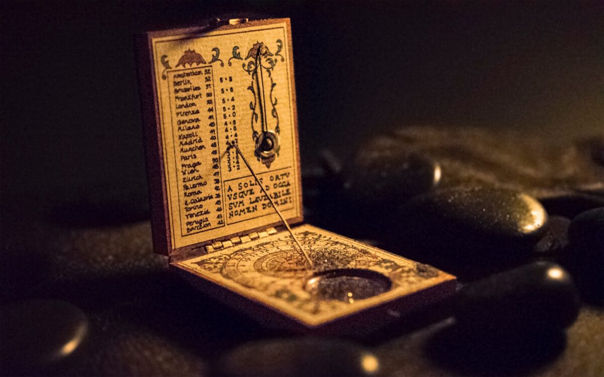 brown and black wooden measuring device