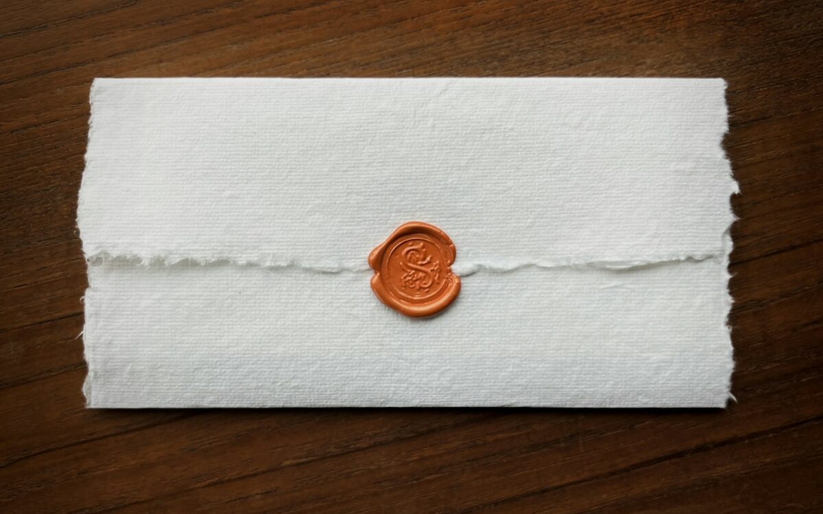 a wax stamp on a piece of paper