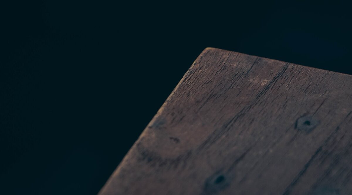 a close up of a piece of wood on a table
