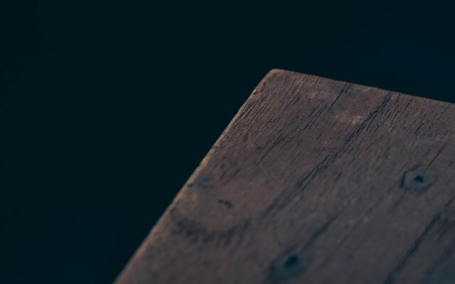 a close up of a piece of wood on a table