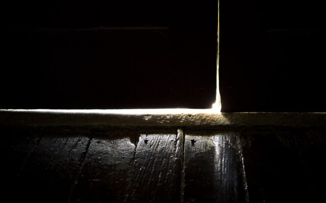 black wooden floor with white light