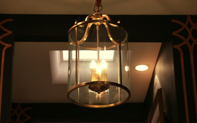 A decorative brass lantern hangs from the ceiling.