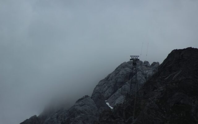 white and black mountain under white sky during daytime