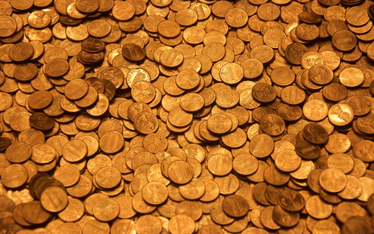 brown round coins on brown wooden surface
